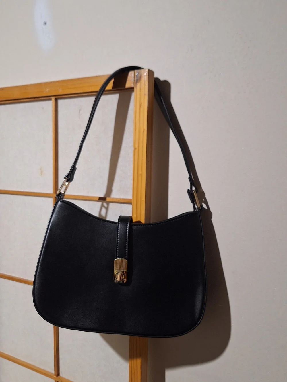 Classic Black Shoulder Bag with Gold Hardware